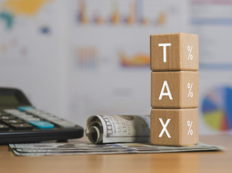 Corporate tax and VAT concept with calculator and money in UAE